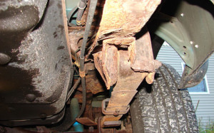 This Tacoma features the double-whammy of a corroded frame and a cracked leaf spring.