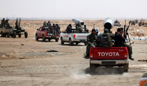 A couple Hilux rolling around with rocket launchers...road rage isn't a problem in Libya, at least not for these truck owners. Hilux rocket launcher